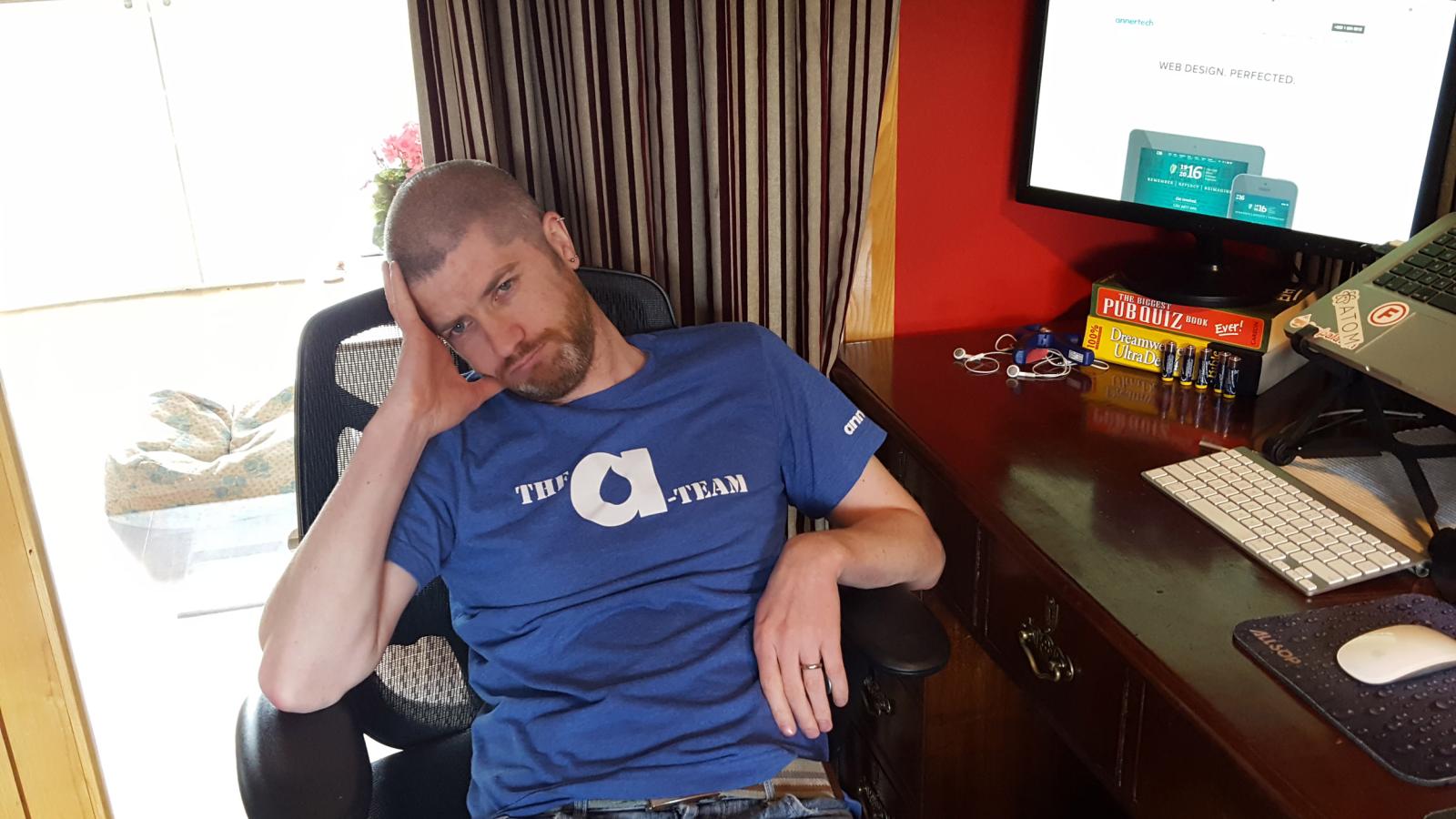 Mark Conroy looking sad because he received designs in Photoshop format